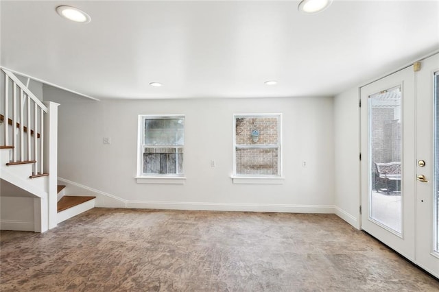 5512 S Tonti St, New Orleans, LA 70125 - unfurnished living room featuring stairway, plenty of natural light, and recessed lighting