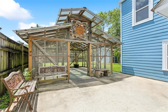5512 S Tonti St, New Orleans, LA 70125 - view of patio / terrace with a fenced backyard and an exterior structure