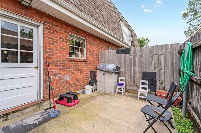 view of patio with fence