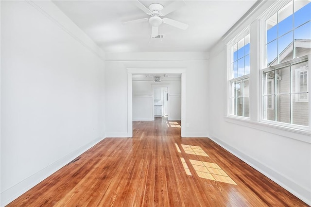 2113 Leonidas St, New Orleans, LA 70118 - spare room with hardwood / wood-style flooring and ceiling fan