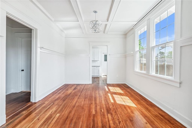 2113 Leonidas St, New Orleans, LA 70118 - unfurnished room with a chandelier, hardwood / wood-style floors, beam ceiling, and coffered ceiling
