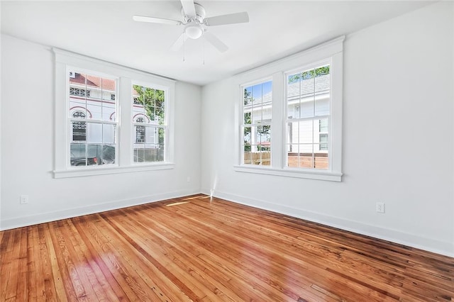 2113 Leonidas St, New Orleans, LA 70118 - unfurnished room featuring plenty of natural light, light wood-type flooring, and ceiling fan