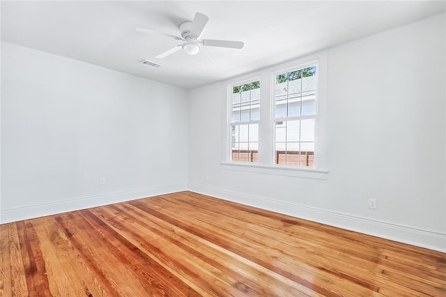 2113 Leonidas St, New Orleans, LA 70118 - unfurnished room with wood finished floors and ceiling fan