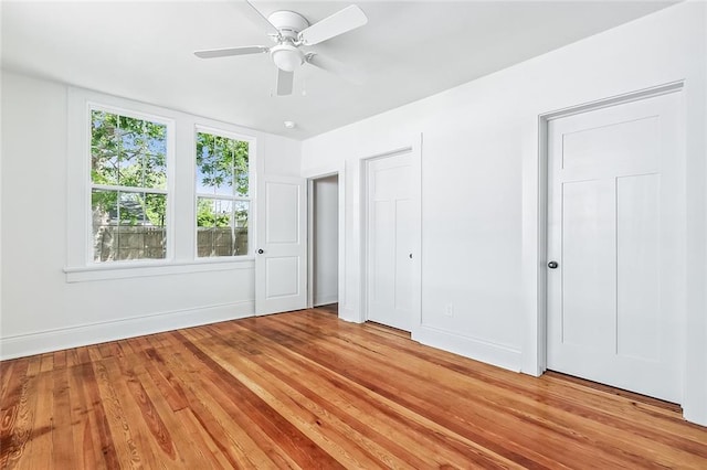 2113 Leonidas St, New Orleans, LA 70118 - unfurnished bedroom featuring light wood-style flooring and ceiling fan