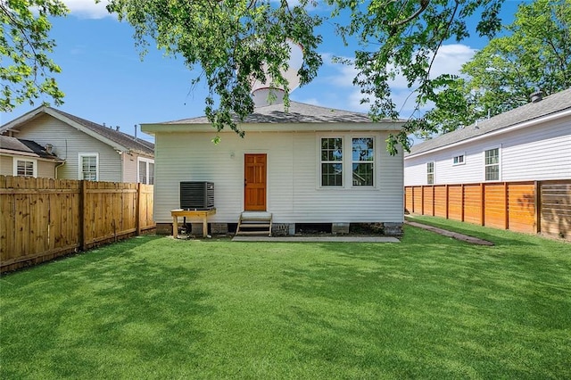 2113 Leonidas St, New Orleans, LA 70118 - rear view of property with entry steps and a fenced backyard