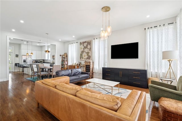 223 S White St, New Orleans, LA 70119 - living area with recessed lighting, plenty of natural light, and wood finished floors