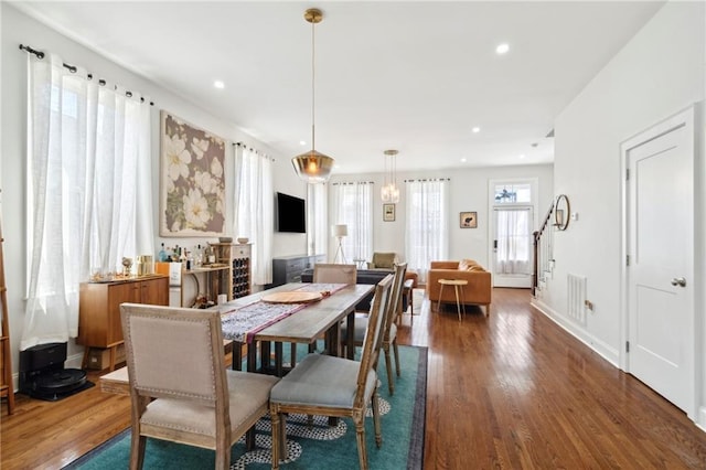 223 S White St, New Orleans, LA 70119 - dining room featuring wood finished floors, baseboards, and recessed lighting