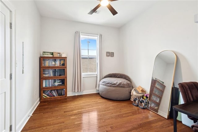223 S White St, New Orleans, LA 70119 - sitting room with visible vents, wood finished floors, baseboards, and ceiling fan