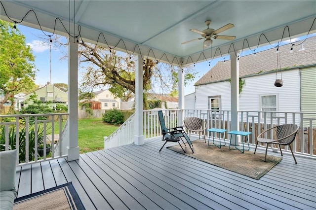 223 S White St, New Orleans, LA 70119 - deck with a lawn, a ceiling fan, and a residential view