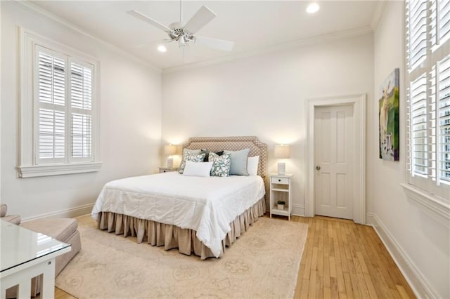 bedroom with light wood-style flooring, recessed lighting, ornamental molding, baseboards, and ceiling fan