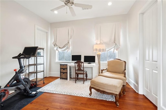 interior space featuring wood finished floors, ceiling fan, and recessed lighting