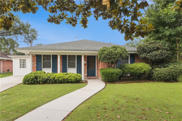 9424 Sharla Dr, River Ridge, LA 70123 - single story home featuring a front yard, brick siding, and covered porch