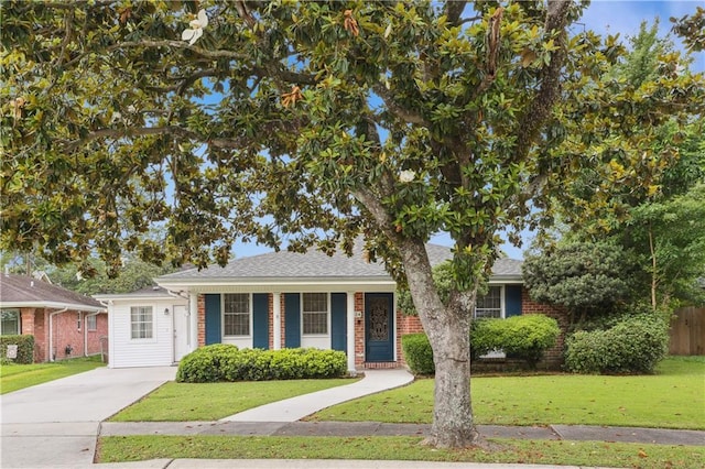 9424 Sharla Dr, River Ridge, LA 70123 - view of front of house with brick siding and a front yard