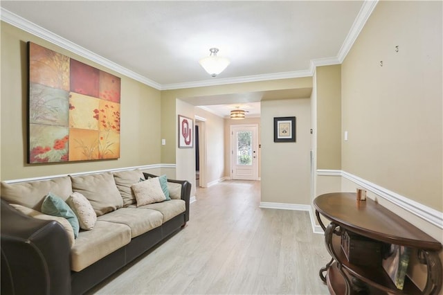 9424 Sharla Dr, River Ridge, LA 70123 - living room featuring baseboards, ornamental molding, and light wood finished floors