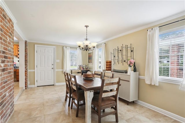 9424 Sharla Dr, River Ridge, LA 70123 - dining area featuring light tile patterned floors, a chandelier, baseboards, and ornamental molding