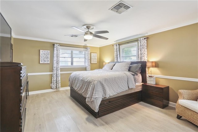 9424 Sharla Dr, River Ridge, LA 70123 - bedroom featuring light wood-type flooring, multiple windows, ornamental molding, and visible vents