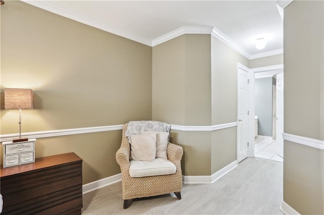 9424 Sharla Dr, River Ridge, LA 70123 - sitting room featuring wood finished floors, baseboards, and ornamental molding
