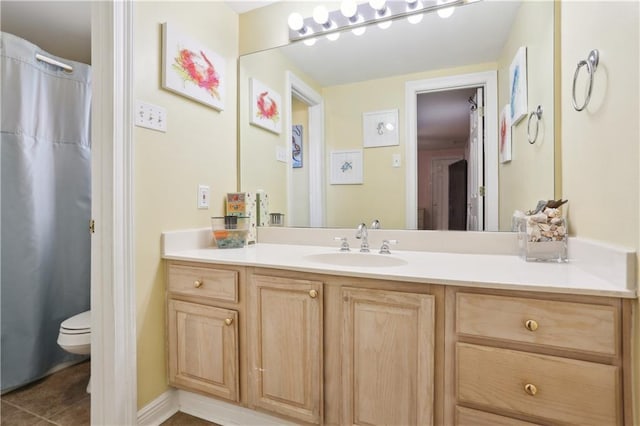 9424 Sharla Dr, River Ridge, LA 70123 - bathroom with toilet, tile patterned flooring, and vanity