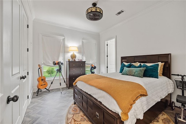 bedroom featuring visible vents, baseboards, and ornamental molding