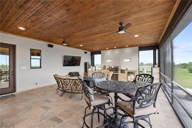 sunroom featuring a healthy amount of sunlight