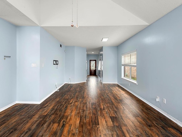 1001 W Chateau Lafitte Dr, Kenner, LA 70065 - empty room with wood finished floors and baseboards