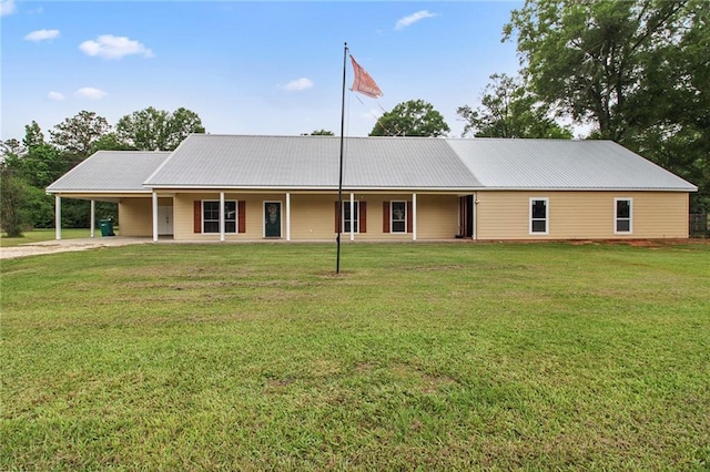 44449 W Pleasant Ridge Rd, Hammond, LA 70403 - single story home with driveway, a front lawn, metal roof, and a carport