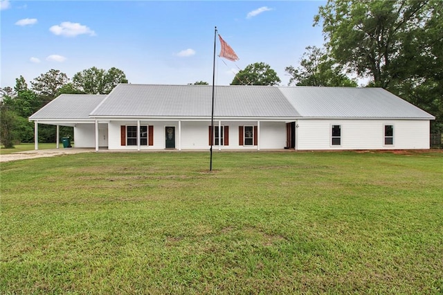 44449 W Pleasant Ridge Rd, Hammond, LA 70403 - ranch-style home featuring a front lawn, driveway, metal roof, and a carport