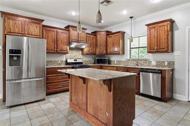 44449 W Pleasant Ridge Rd, Hammond, LA 70403 - kitchen featuring a center island, a sink, visible vents, under cabinet range hood, and appliances with stainless steel finishes