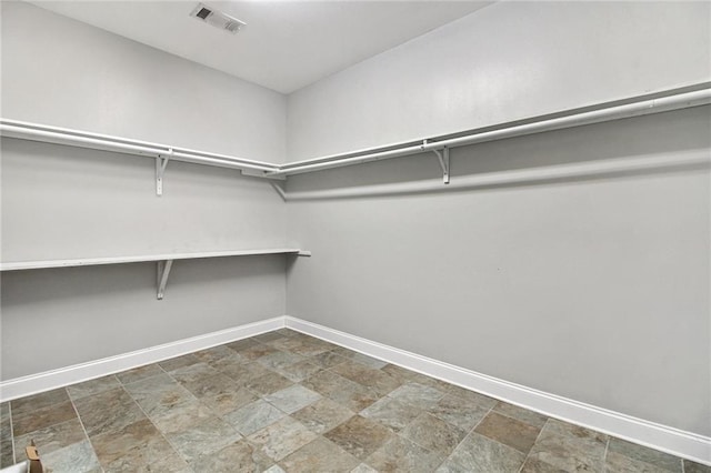44449 W Pleasant Ridge Rd, Hammond, LA 70403 - spacious closet with stone finish flooring and visible vents