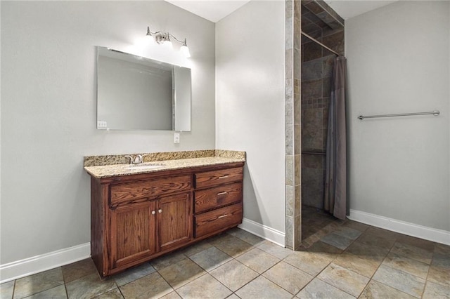 44449 W Pleasant Ridge Rd, Hammond, LA 70403 - bathroom with vanity, baseboards, and a tile shower
