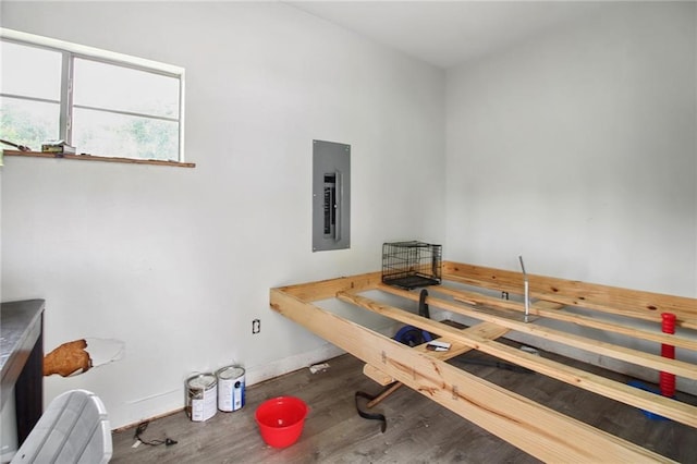 44449 W Pleasant Ridge Rd, Hammond, LA 70403 - bedroom with baseboards, electric panel, and wood finished floors