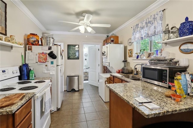3537 Thrasher St, New Orleans, LA 70124 - kitchen with white appliances, a sink, brown cabinetry, ornamental molding, and open shelves