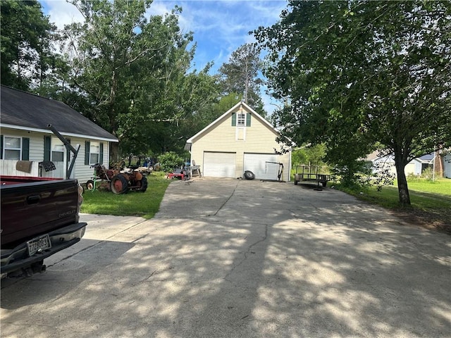 41139 Happywoods Rd, Hammond, LA 70403 - view of home's exterior featuring an outdoor structure and a garage