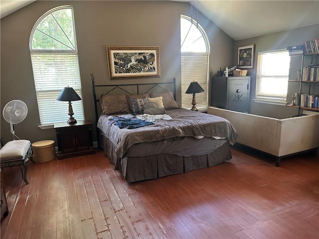 41139 Happywoods Rd, Hammond, LA 70403 - bedroom featuring lofted ceiling, multiple windows, and hardwood / wood-style floors