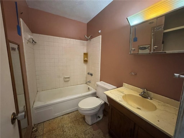 full bath with bathing tub / shower combination, toilet, tile patterned floors, and vanity