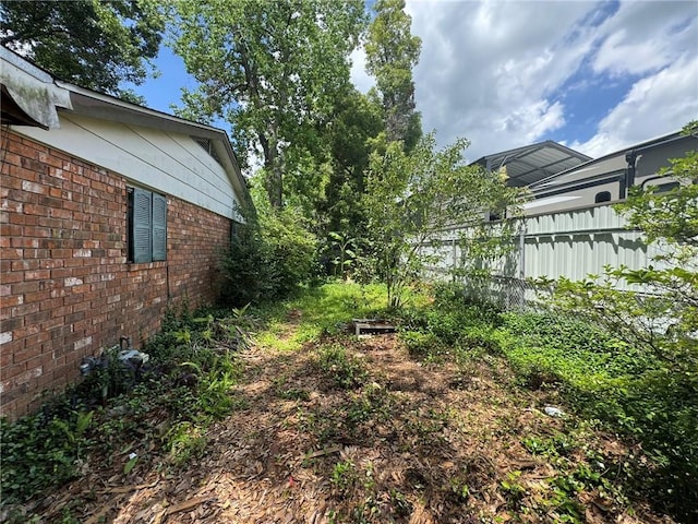 view of yard featuring fence