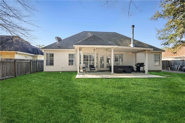 rear view of property with an outdoor living space, a patio, a fenced backyard, and a lawn