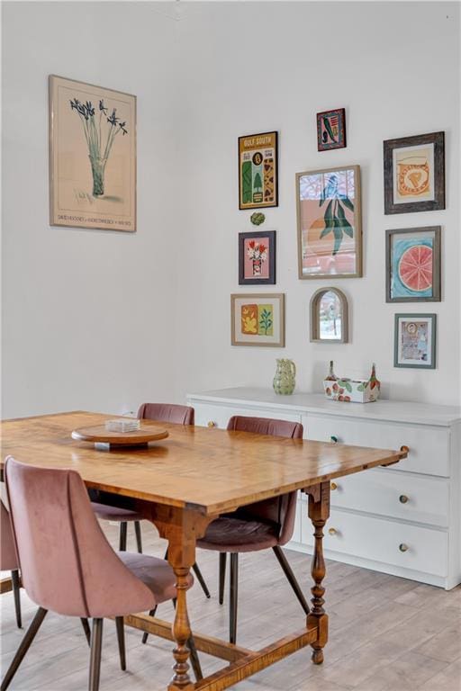 dining room featuring light wood-type flooring