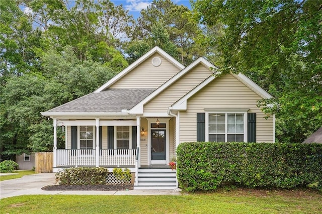 71238 Shady Lake Dr, Covington, LA 70433 - view of front facade featuring a porch and roof with shingles