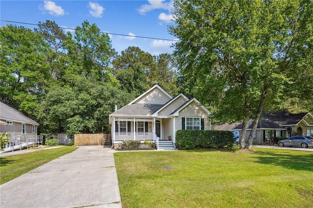 71238 Shady Lake Dr, Covington, LA 70433 - bungalow-style home featuring covered porch, a front yard, and driveway