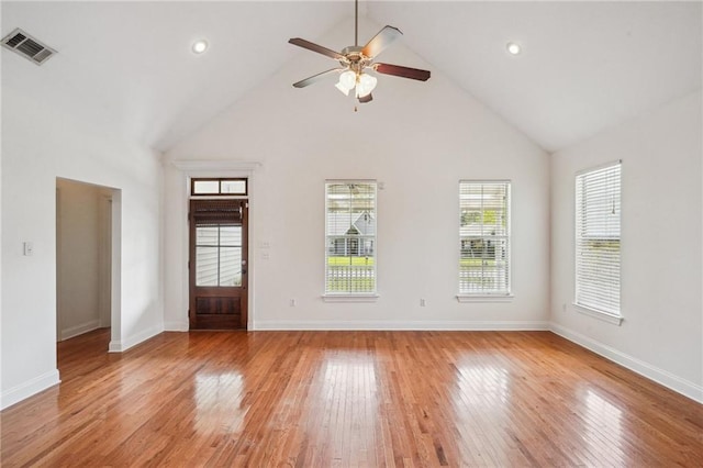 71238 Shady Lake Dr, Covington, LA 70433 - spare room featuring a ceiling fan, baseboards, visible vents, high vaulted ceiling, and light wood-style floors