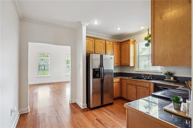 71238 Shady Lake Dr, Covington, LA 70433 - kitchen with a sink, stainless steel fridge with ice dispenser, crown molding, tile counters, and light wood-type flooring