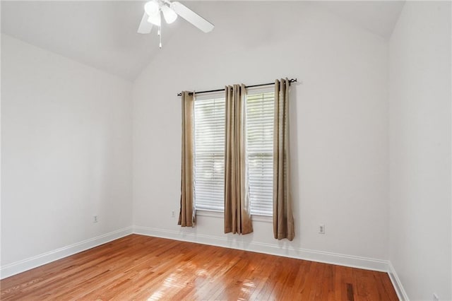 71238 Shady Lake Dr, Covington, LA 70433 - empty room with a ceiling fan, baseboards, light wood finished floors, and vaulted ceiling