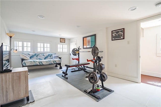 workout room featuring recessed lighting