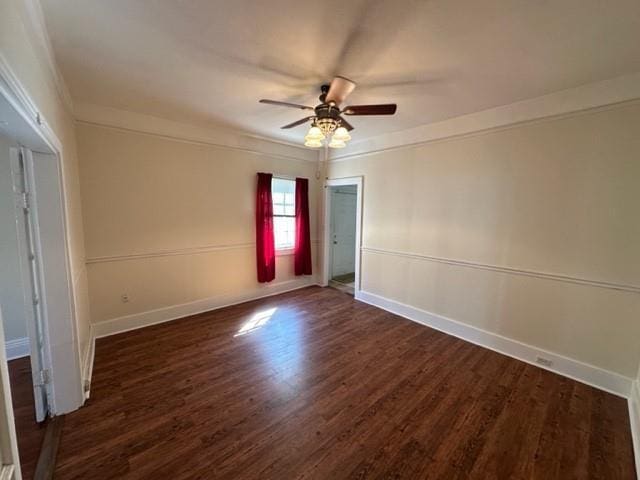 526 Bellecastle St, New Orleans, LA 70115 - unfurnished room with ceiling fan, wood finished floors, crown molding, and baseboards
