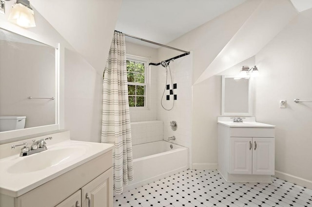 bathroom featuring vanity, toilet, baseboards, and shower / bathtub combination with curtain