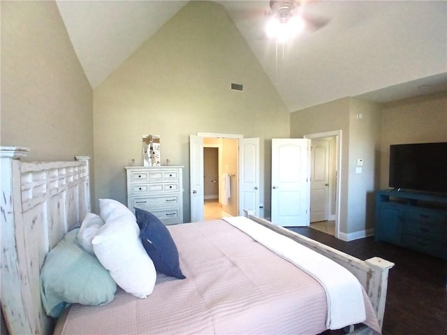bedroom with wood finished floors, a ceiling fan, high vaulted ceiling, visible vents, and baseboards