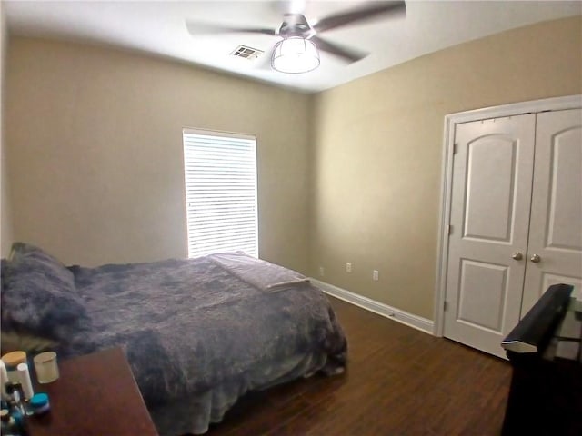 217 Turning Leaf Ln, Madisonville, LA 70447 - bedroom featuring dark wood finished floors, ceiling fan, and baseboards