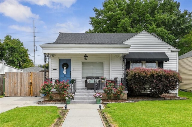26 Davis Blvd, Jefferson, LA 70121 - view of front facade with a porch and roof with shingles