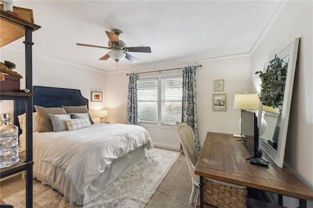 bedroom with crown molding, baseboards, and carpet floors